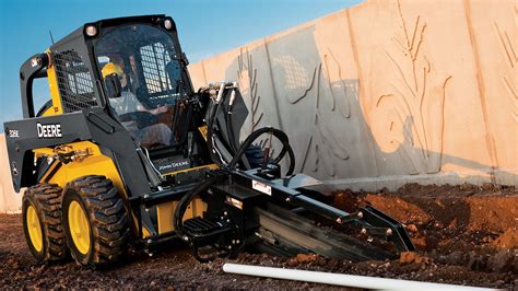 cutting ditch with skid steer|digging a drainage ditch.